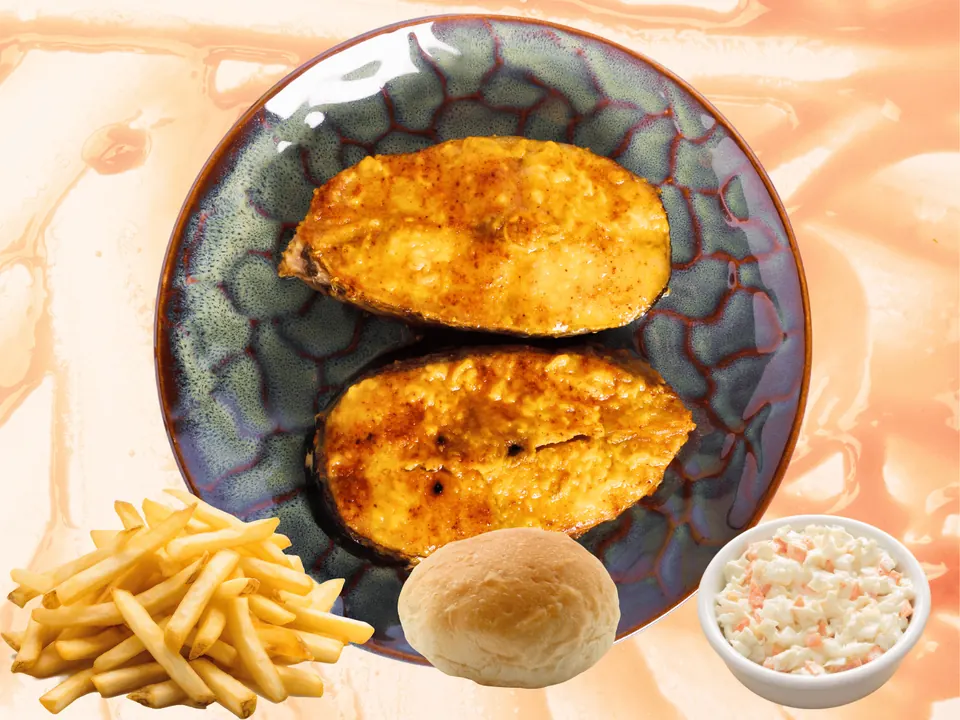 Fried catfish fillets with fries, coleslaw and a dinner roll
