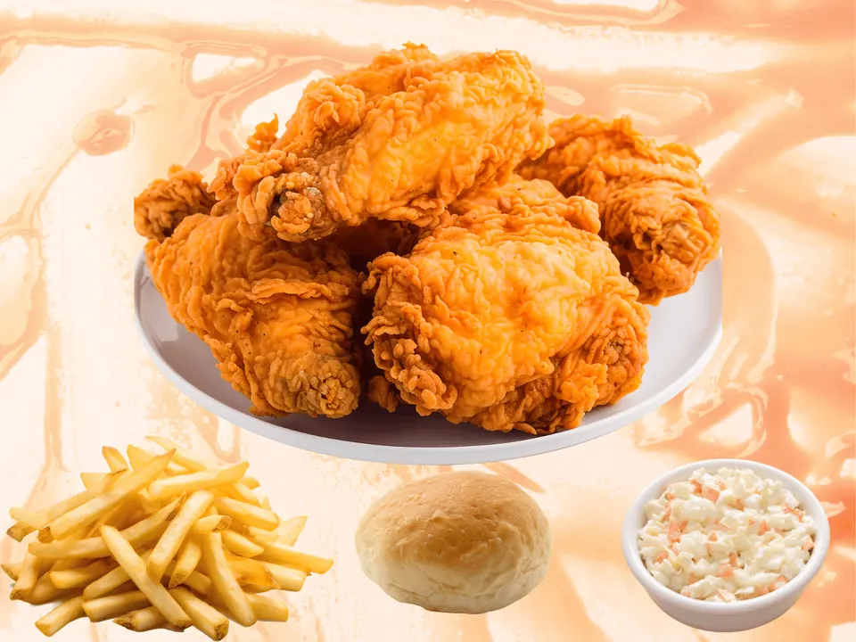 Fried chicken legs and thighs with fries