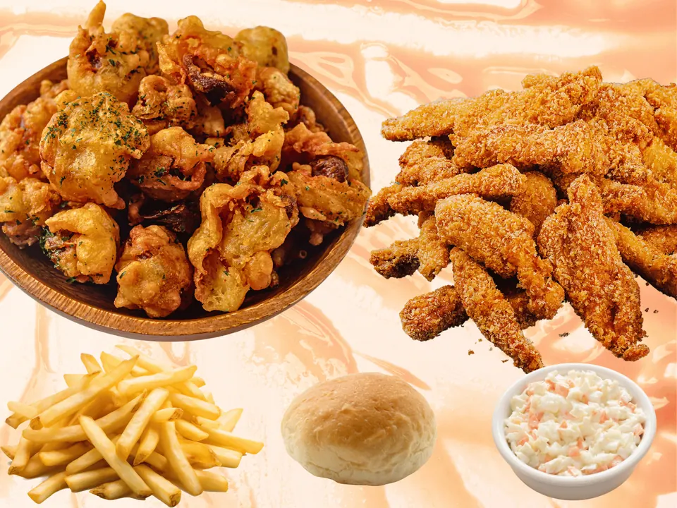 Chicken tenders dinner with fries, coleslaw and a dinner roll