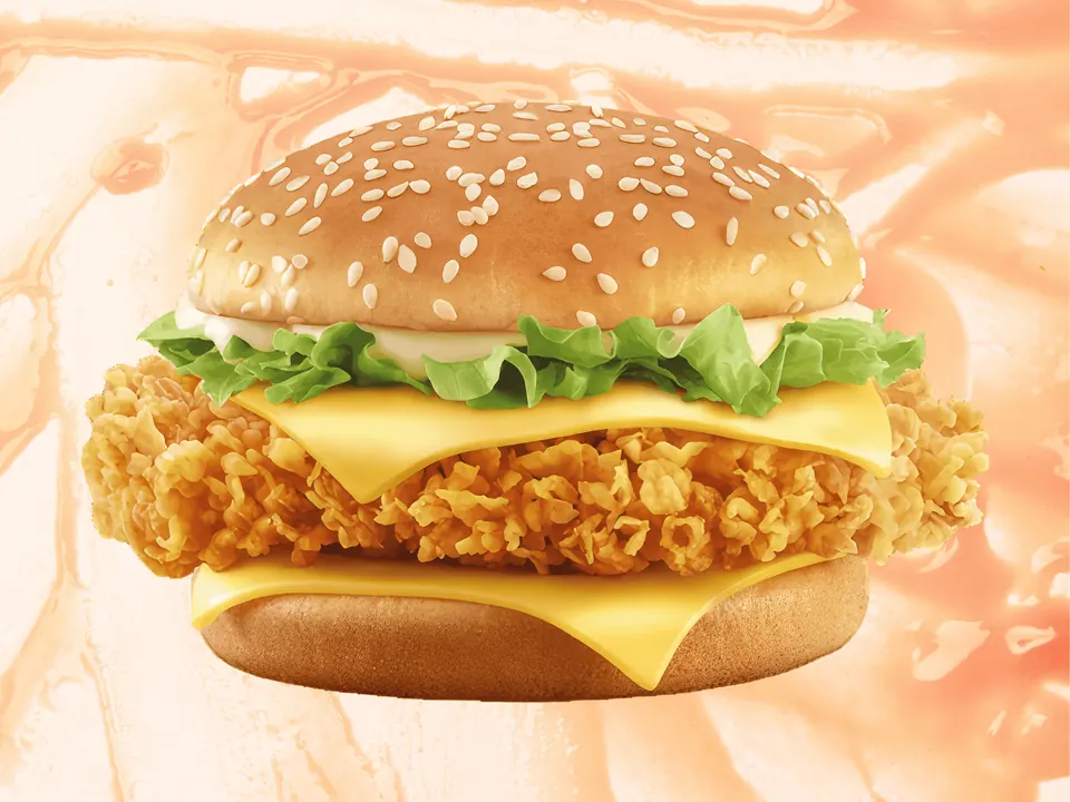 Crispy chicken breast sandwich with cheese, lettuce and tomato