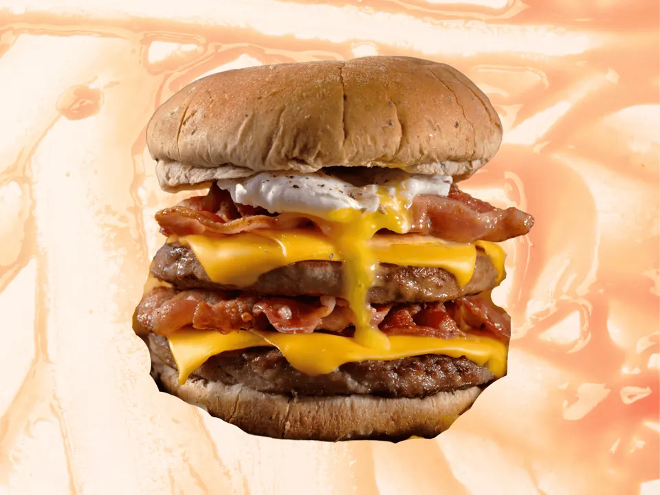 Double cheeseburger topped with a fried egg